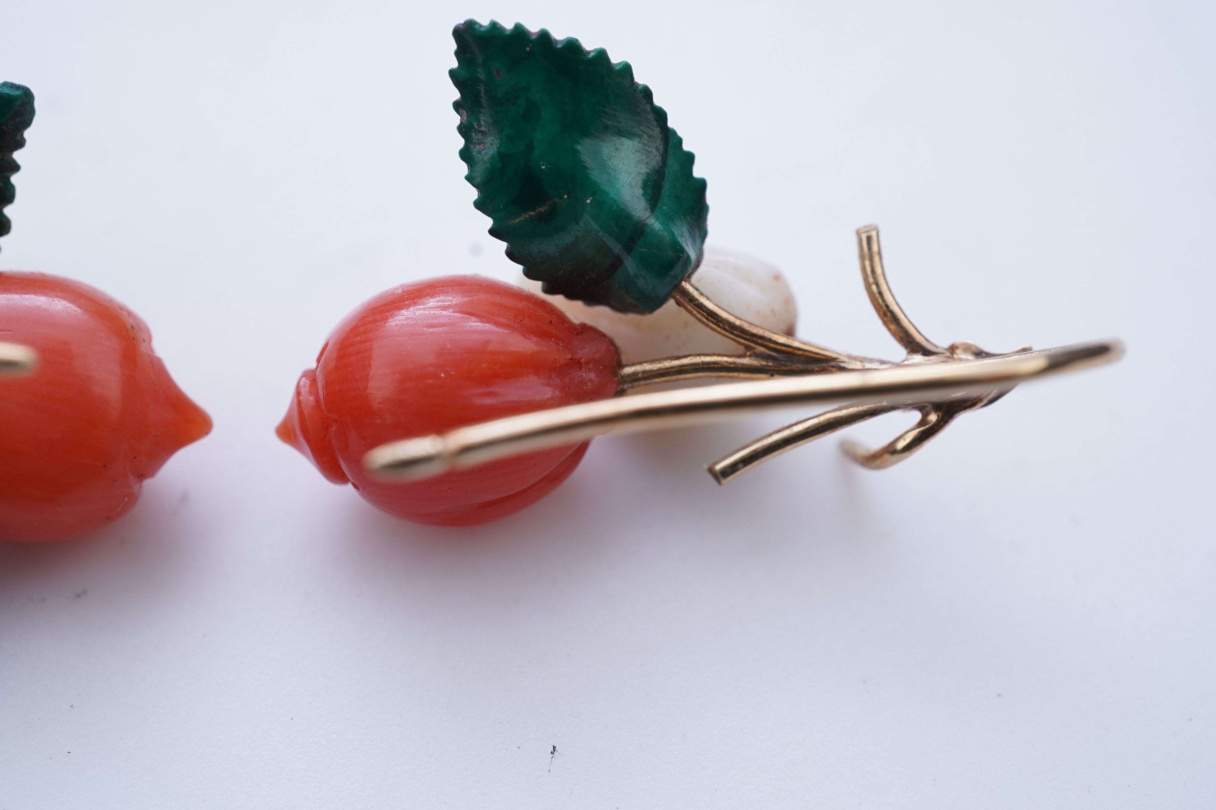 A rare coral and malachite demi-parure, mid 19th century and later